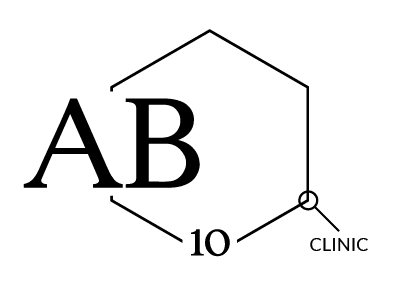 Silhouette of a person sitting on chair.